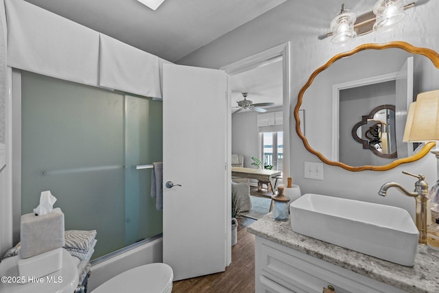 938 E Bayside Dr, Chocowinity, NC 27817 - bathroom featuring vanity, wood finished floors, shower / washtub combination, and ceiling fan