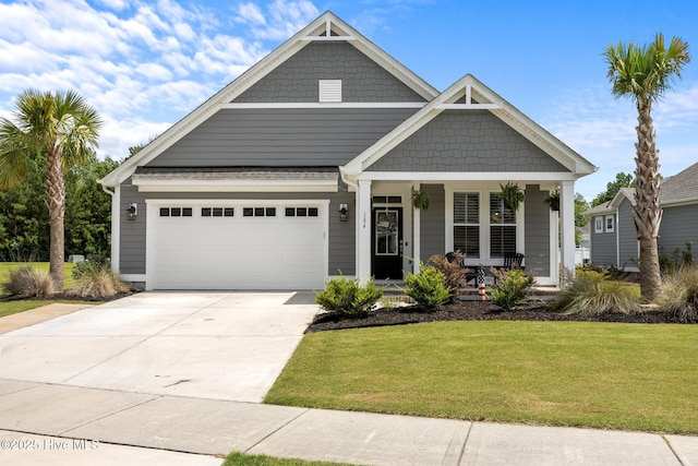 184 Twining Rose Ln, Holly Ridge, NC 28445 - craftsman-style house with a porch, a front lawn, driveway, and a garage