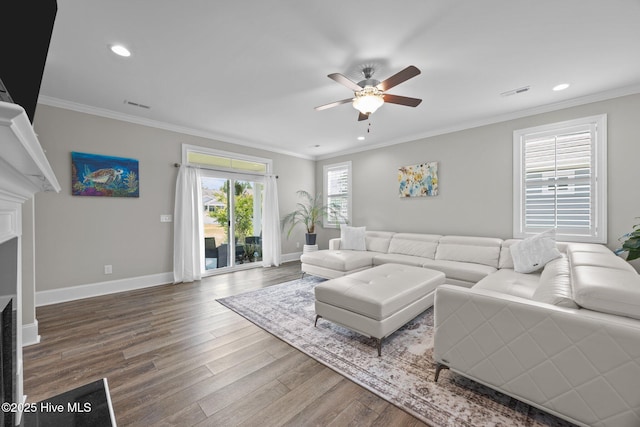 184 Twining Rose Ln, Holly Ridge, NC 28445 - living room featuring a ceiling fan, wood finished floors, recessed lighting, and ornamental molding