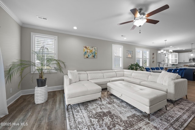 184 Twining Rose Ln, Holly Ridge, NC 28445 - living room with a chandelier, a ceiling fan, wood finished floors, ornamental molding, and recessed lighting
