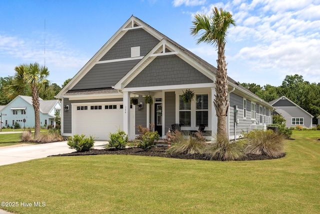 184 Twining Rose Ln, Holly Ridge, NC 28445 - view of front facade with a porch, a front lawn, and driveway