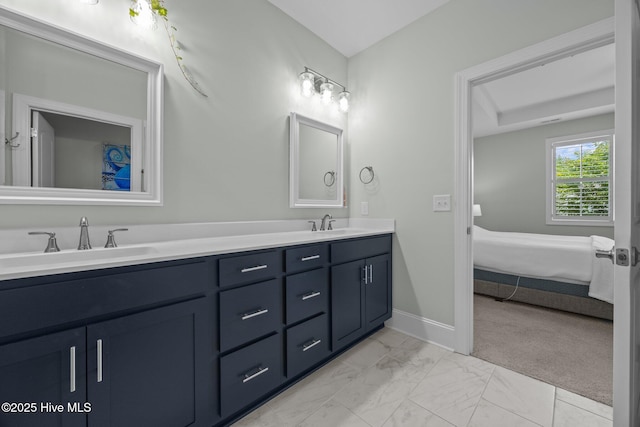 184 Twining Rose Ln, Holly Ridge, NC 28445 - ensuite bathroom with double vanity and marble look tiles