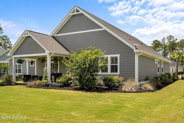 184 Twining Rose Ln, Holly Ridge, NC 28445 - view of front of property with a front yard and covered porch