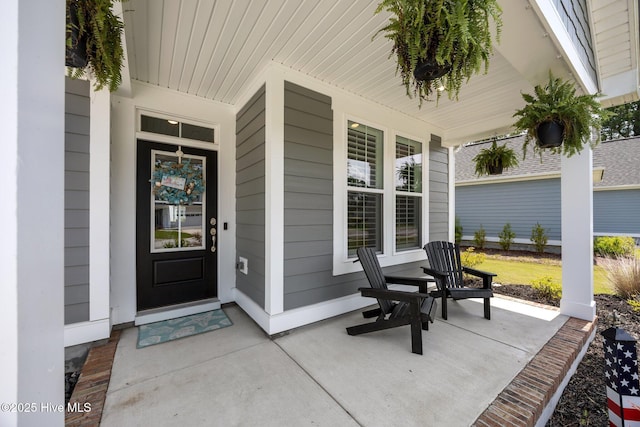184 Twining Rose Ln, Holly Ridge, NC 28445 - entrance to property featuring a porch