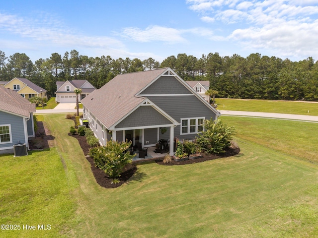 184 Twining Rose Ln, Holly Ridge, NC 28445 - rear view of property featuring a lawn and a patio