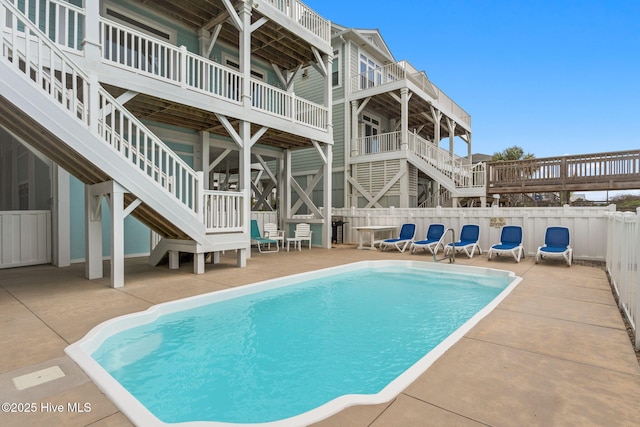 328 E First St, Ocean Isle Beach, NC 28469 - view of pool featuring a patio area and stairs