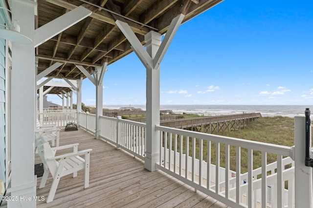 328 E First St, Ocean Isle Beach, NC 28469 - wooden deck featuring a water view