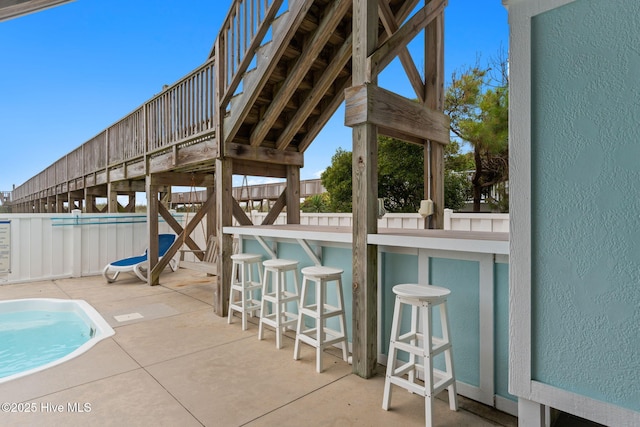 328 E First St, Ocean Isle Beach, NC 28469 - view of swimming pool featuring a patio