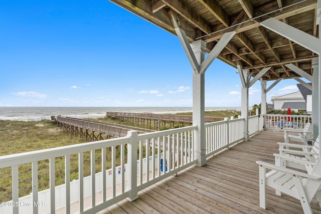 328 E First St, Ocean Isle Beach, NC 28469 - wooden deck with view of water and beach