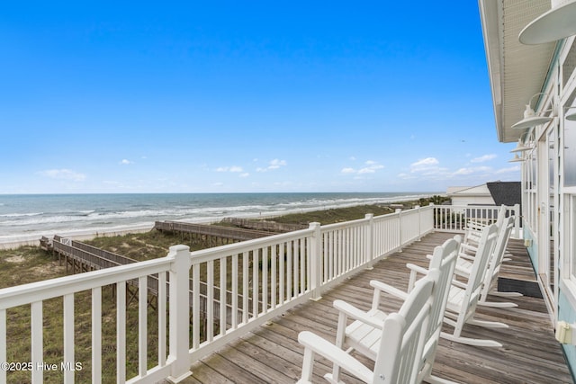 328 E First St, Ocean Isle Beach, NC 28469 - wooden terrace featuring view of water and beach