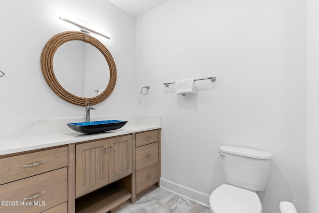 328 E First St, Ocean Isle Beach, NC 28469 - half bath featuring vanity and marble finish flooring