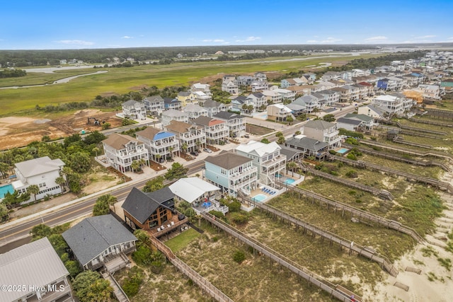 328 E First St, Ocean Isle Beach, NC 28469 - aerial perspective of suburban area featuring a golf course