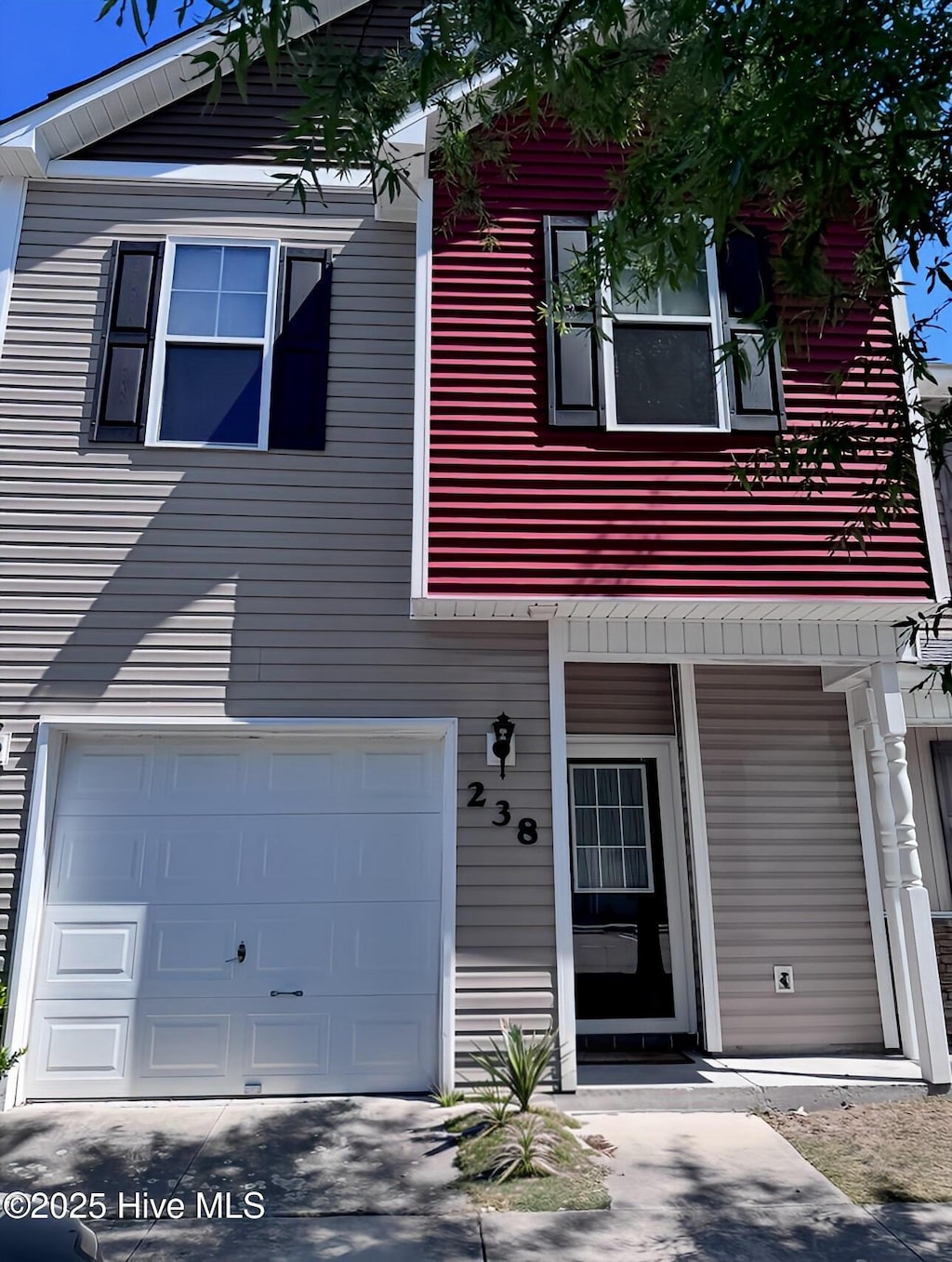238 Caldwell Loop, Jacksonville, NC 28546 - view of front facade featuring an attached garage