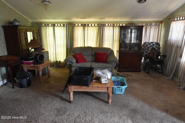 404 N Third St, Carolina Beach, NC 28428 - living room featuring carpet floors, ornamental molding, and vaulted ceiling