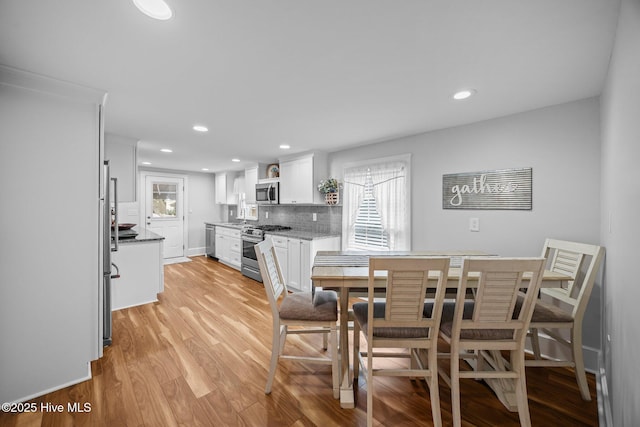 209 E Main St, Washington, NC 27889 - dining space featuring light wood finished floors and recessed lighting
