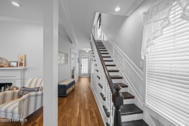 209 E Main St, Washington, NC 27889 - stairs with a fireplace, ornamental molding, recessed lighting, and wood finished floors