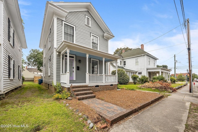 209 E Main St, Washington, NC 27889 - view of front of house featuring a porch and crawl space