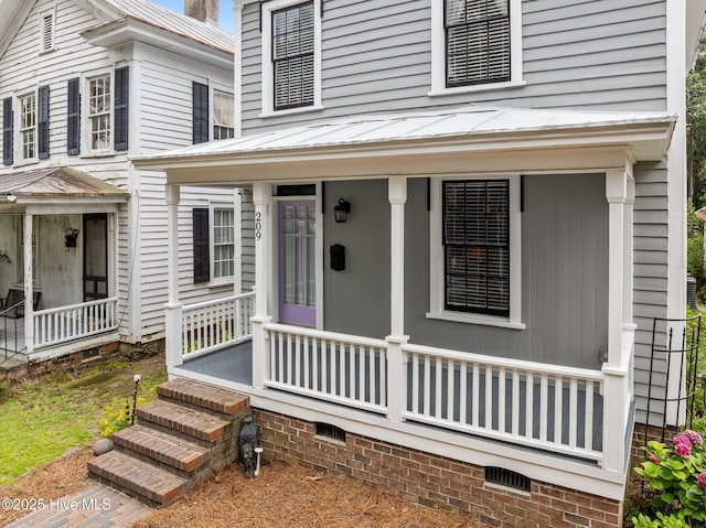 209 E Main St, Washington, NC 27889 - view of front facade featuring covered porch and crawl space