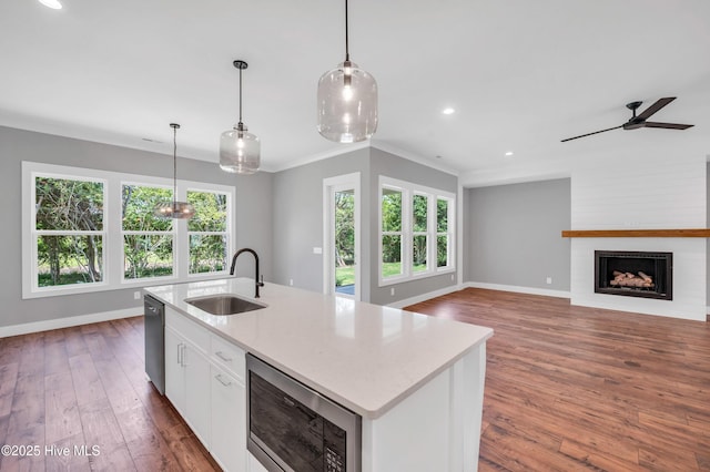 5988 Gray Squirrel Path, Southport, NC 28461 - kitchen featuring black microwave, dishwasher, white cabinetry, recessed lighting, and dark wood-type flooring