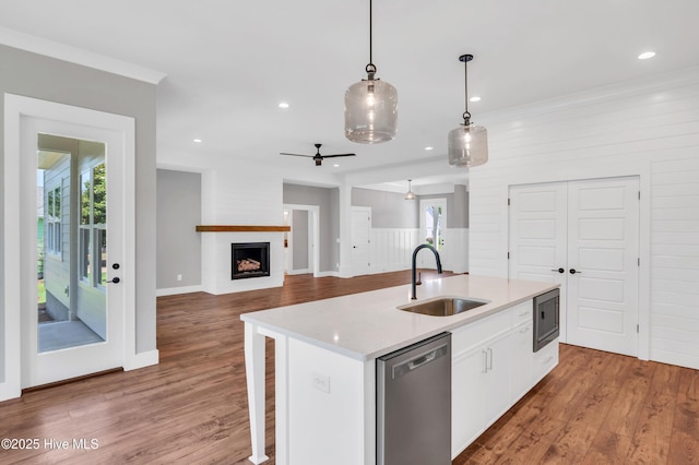 5988 Gray Squirrel Path, Southport, NC 28461 - kitchen with appliances with stainless steel finishes, a ceiling fan, wood finished floors, hanging light fixtures, and recessed lighting