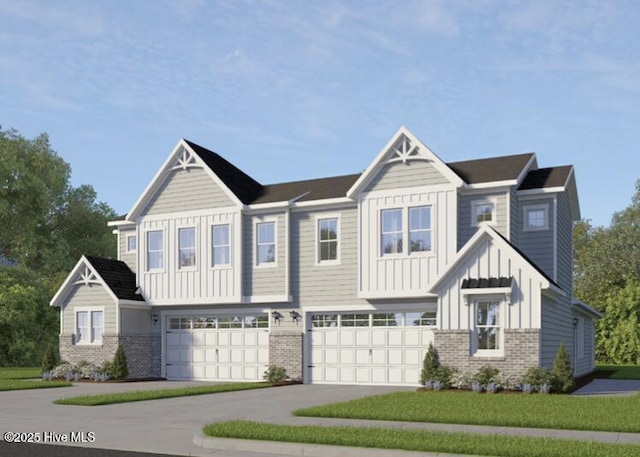 3170 Painted Turtle Loop Unit 4, Wilmington, NC 28409 - craftsman house featuring board and batten siding, a garage, brick siding, and driveway