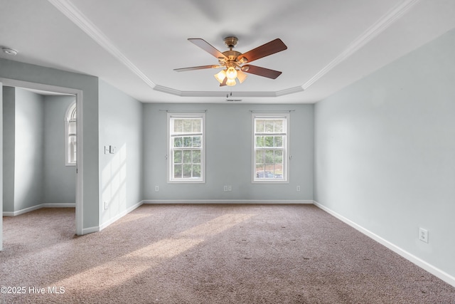 225 Woodshire Dr, Lillington, NC 27546 - carpeted empty room featuring a tray ceiling, a ceiling fan, crown molding, and a smoke detector