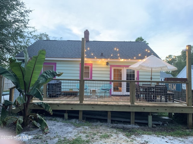 606 Ivey Cir, Wilmington, NC 28401 - rear view of property with a shingled roof and a wooden deck