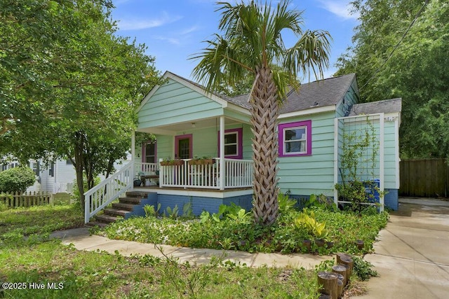 606 Ivey Cir, Wilmington, NC 28401 - bungalow-style home featuring covered porch and roof with shingles
