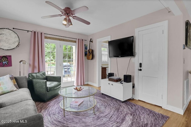 606 Ivey Cir, Wilmington, NC 28401 - living room with ceiling fan and light wood finished floors