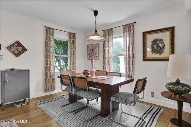 606 Ivey Cir, Wilmington, NC 28401 - dining area with healthy amount of natural light and light wood finished floors