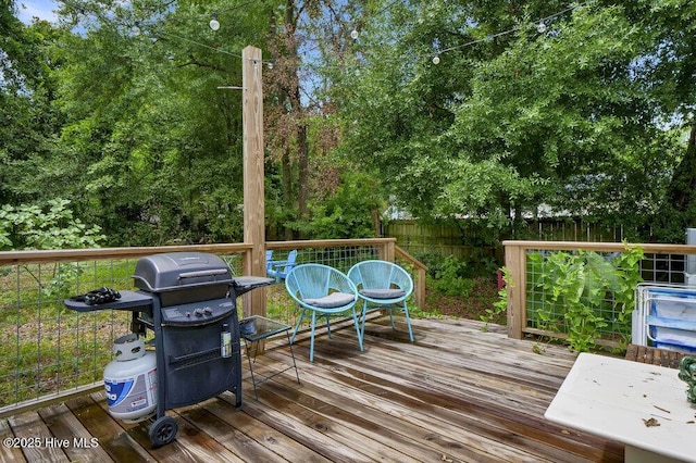 606 Ivey Cir, Wilmington, NC 28401 - wooden terrace with grilling area