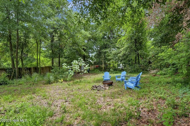 606 Ivey Cir, Wilmington, NC 28401 - view of yard with an outdoor fire pit