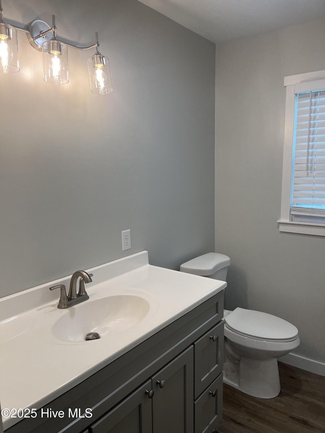 832 Fanning St, Wilmington, NC 28401 - half bath with vanity and wood finished floors