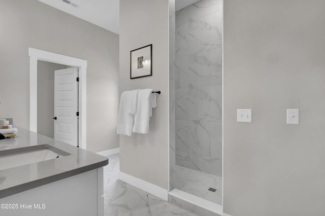 121 S Branch Rd, Wilmington, NC 28411 - full bath featuring marble finish flooring, vanity, and a marble finish shower