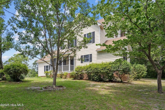 2544 Blake Trl, Wilmington, NC 28409 - view of front of home featuring a front yard and roof with shingles