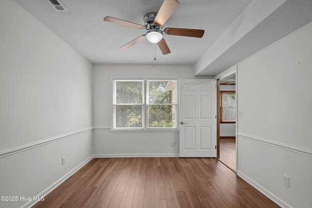 2544 Blake Trl, Wilmington, NC 28409 - spare room featuring ceiling fan and wood finished floors