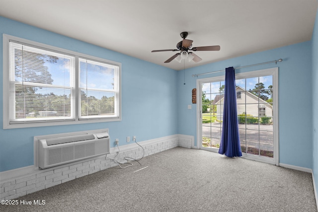 2544 Blake Trl, Wilmington, NC 28409 - spare room with carpet flooring, an AC wall unit, and ceiling fan