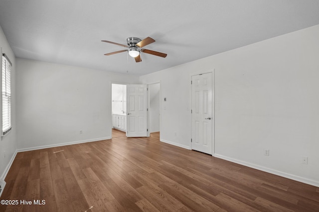 2544 Blake Trl, Wilmington, NC 28409 - empty room with ceiling fan and wood finished floors