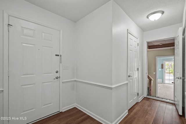2544 Blake Trl, Wilmington, NC 28409 - foyer featuring dark wood-type flooring and baseboards