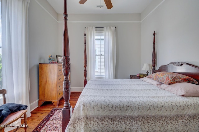 214 Nun St, Wilmington, NC 28401 - bedroom with wood finished floors and a ceiling fan
