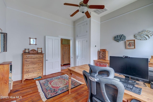 214 Nun St, Wilmington, NC 28401 - home office with a ceiling fan and wood finished floors