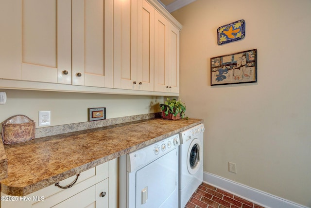 214 Nun St, Wilmington, NC 28401 - laundry area featuring washing machine and clothes dryer and cabinet space