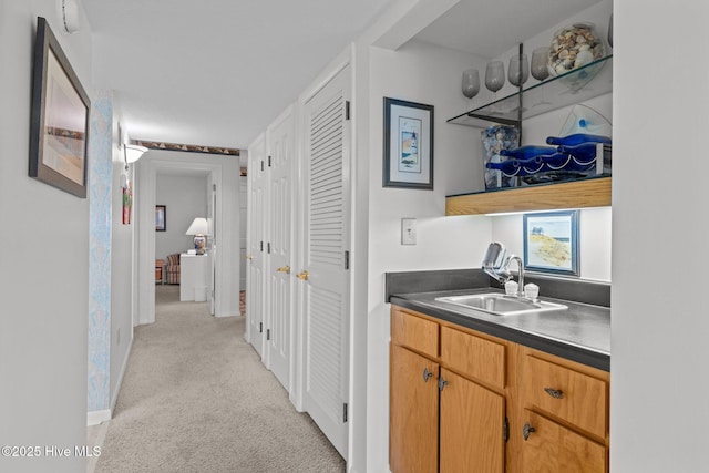 10300 Coast Guard Rd Unit E206Point, Emerald Villas, Emerald Isle, NC 28594 - bar with a sink and light colored carpet