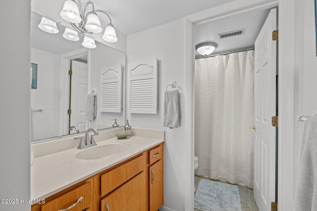 10300 Coast Guard Rd Unit E206Point, Emerald Villas, Emerald Isle, NC 28594 - bathroom featuring vanity, a shower with curtain, and tile patterned flooring