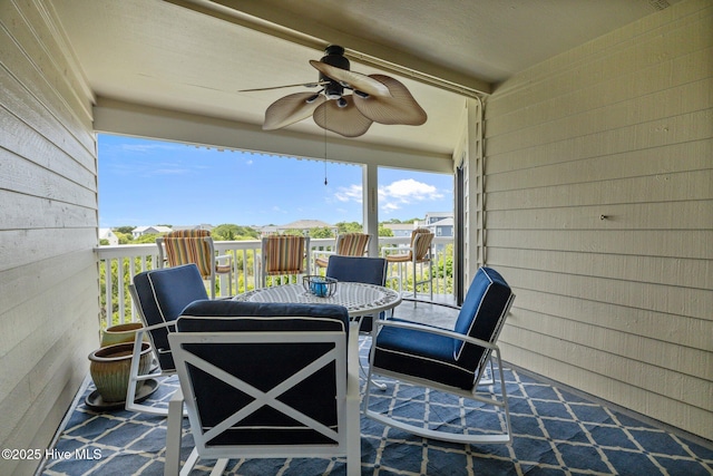 10300 Coast Guard Rd Unit E206Point, Emerald Villas, Emerald Isle, NC 28594 - view of patio featuring ceiling fan and outdoor dining area