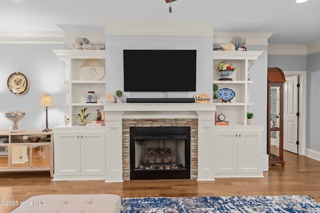 9134 Ocean Harbour Golf Club Rd SW, Calabash, NC 28467 - living area with light wood-type flooring, a fireplace, and crown molding
