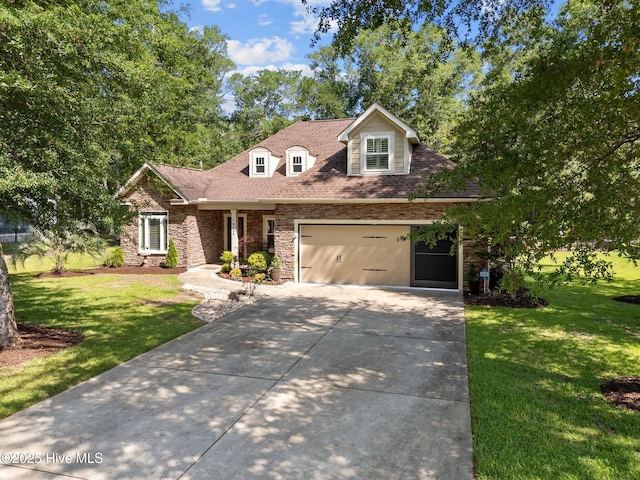 9134 Ocean Harbour Golf Club Rd SW, Calabash, NC 28467 - view of front of house with concrete driveway, a front yard, an attached garage, and a shingled roof