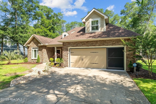 9134 Ocean Harbour Golf Club Rd SW, Calabash, NC 28467 - view of front facade featuring concrete driveway, stone siding, roof with shingles, and an attached garage