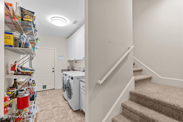 9134 Ocean Harbour Golf Club Rd SW, Calabash, NC 28467 - laundry room featuring cabinet space and washing machine and clothes dryer