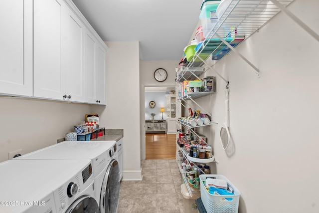 9134 Ocean Harbour Golf Club Rd SW, Calabash, NC 28467 - laundry room featuring cabinet space, washer and clothes dryer, and light tile patterned floors